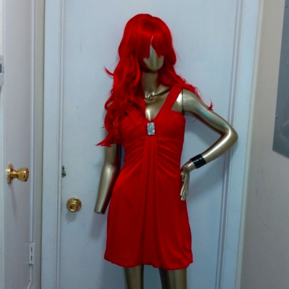 Masquerade red dress with diamond pendent in the front zips down in the back